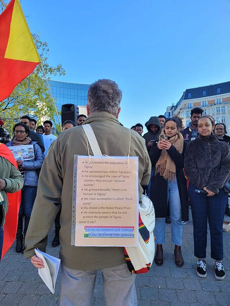 Jan Nyssen making sounds that pass for rhetoric at a pro-TPLF protest in Brussels in 2022